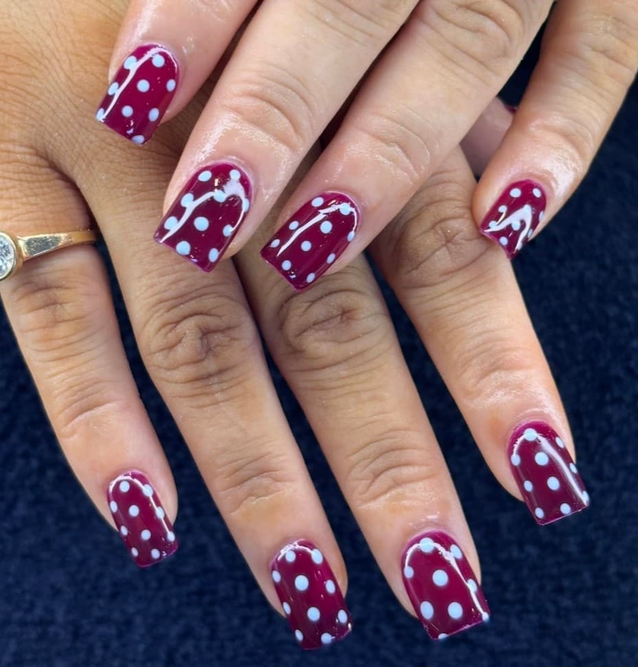 Pastel floral accent nails with glitter french tips — tier 2