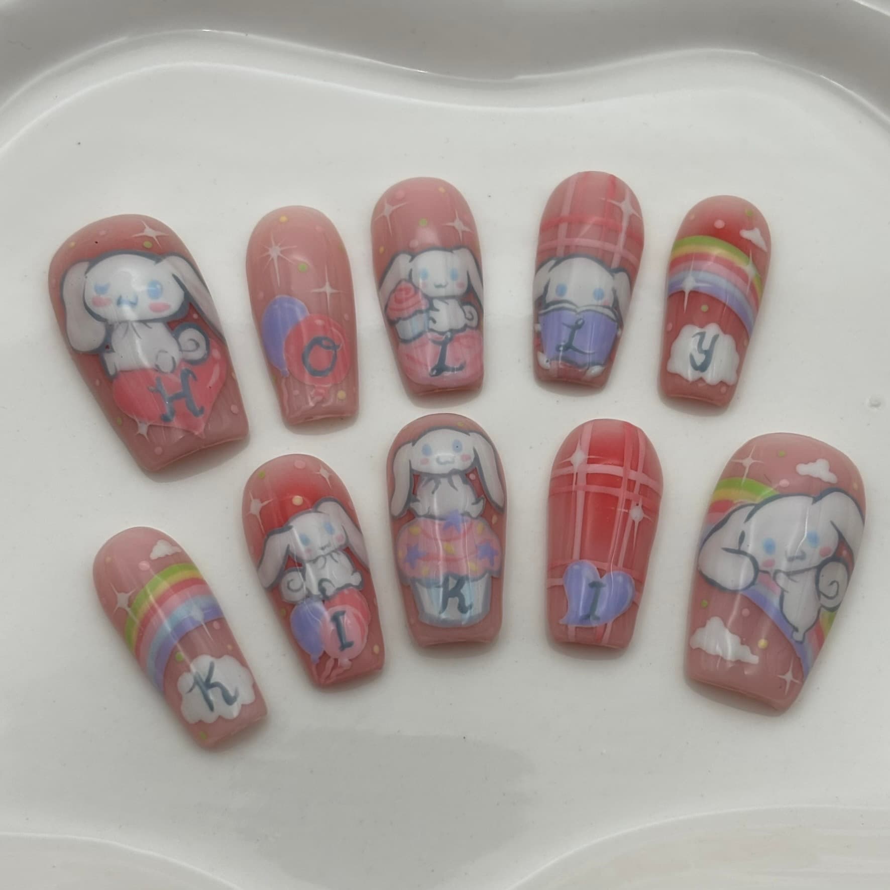Anime portrait nail art across a full set — tier 4